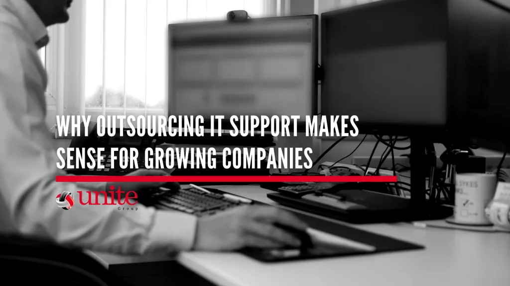Outsourcing IT Support banner- includes a man sitting at a computer working