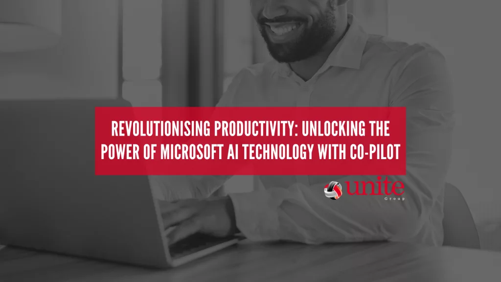 image shows man on laptop smiling. text on top reads: Revolutionising Productivity: Unlocking the Power of Microsoft AI Technology with Co-Pilot